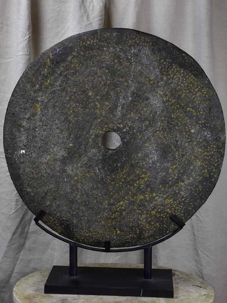 Large mounted stone disc from Papua New Guinea