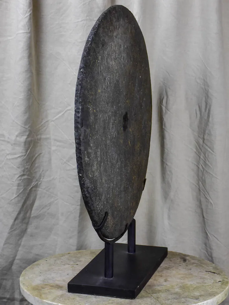 Large mounted stone disc from Papua New Guinea