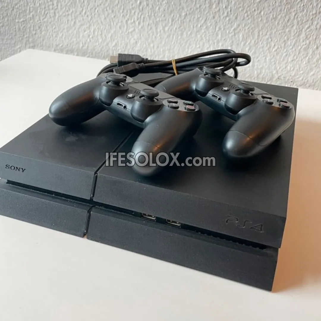 Sony Playstation 4 (PS4) 500GB Game Console with 2 DUALSHOCK 4 Controllers and 10 Games - Foreign Used